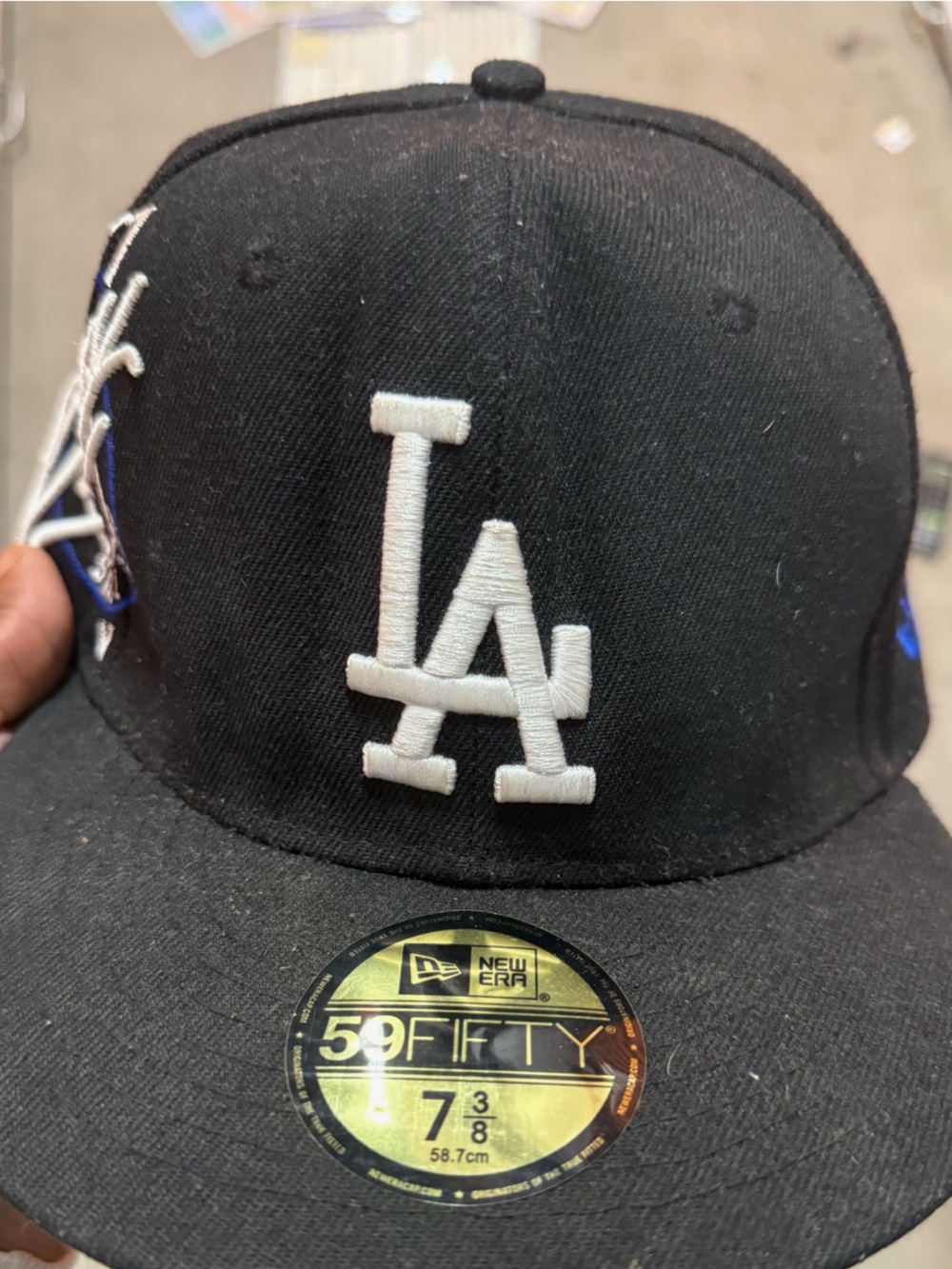 New Era Black Hat with White Embroidered Logo